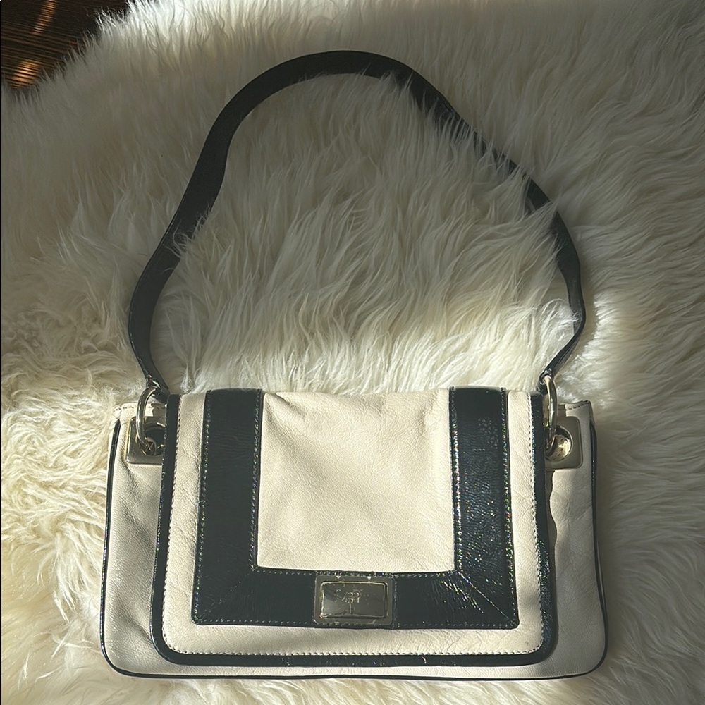 Kate Spade Sophisticated Black and Cream Shoulder Bag with Structured Design